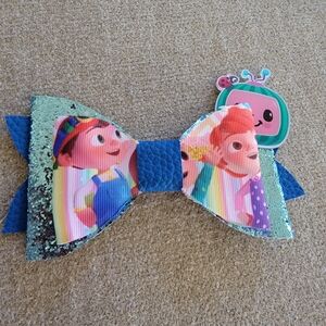 * cocomelon handmade bow from boutique, 1 of a kind, never worn
